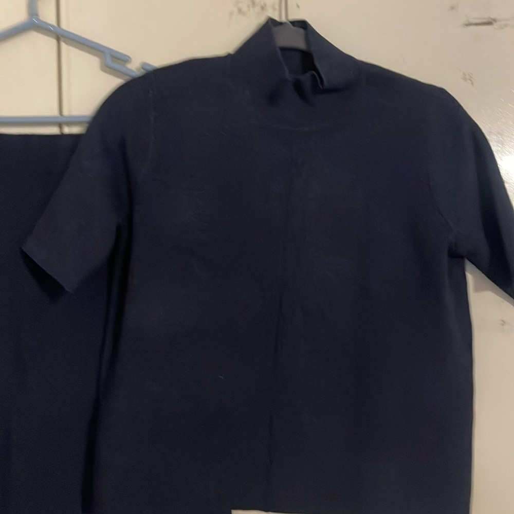 2 piece working outfit
Blouse & Skirt with slit
Color Navy Blue